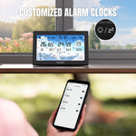 Load image into Gallery viewer, Raddy N90 Wi-Fi Weather Station clock displaying weather information with a smartphone app on a blurred outdoor background